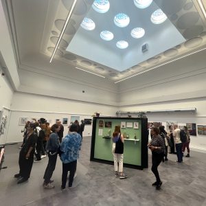 Picture of people walking about in a exhibition space at The Bank at The Digital Hub.